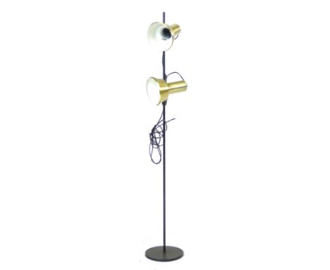A 1980's twin spot brass coloured standard lamp CONDITION REPORT: Working order unknown, losses and pitting, no plug
