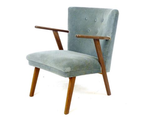 A 1950's teak framed and button upholstered cocktail chair CONDITION REPORT: Wear commensurate with age and use