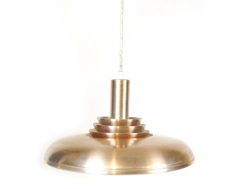 A 1970's copper coloured ceiling light with three rims and a central column CONDITION REPORT: Working order unknown, some wea