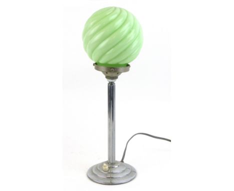 A 1930's table lamp, the moulded glass green spherical shade on an aluminium shaft of classical form, h. 40 cm CONDITION REPO