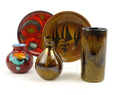 A group of Poole Delphis and Aegean wares including a cylindrical vase, two plates etc. CONDITION REPORT: No obvious chips, c