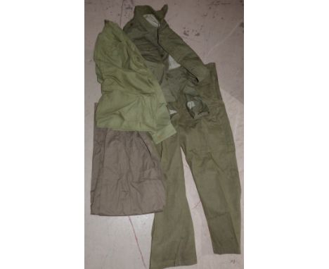 A pair of British Army Denim overall trousers dated 1945, a similar jacket and two other items of vintage clothing