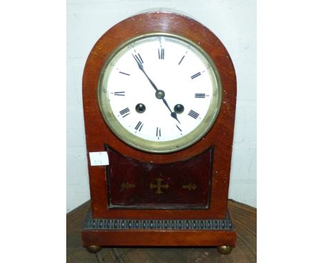 An Inlaid mantle clock with French movement with mahogany case with enamel dial. 