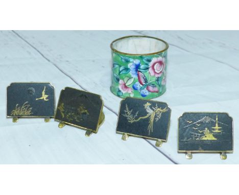 A set of four Japanese precious metal inlaid menu holders and a Chinese enamel napkin ring