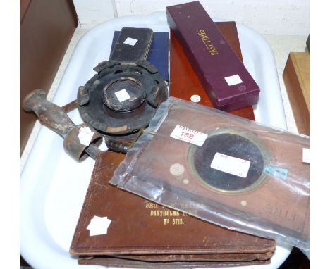 A 19th century magic lantern revolving slide; a mahogany microscope slide box; a 19th century corkscrew etc.