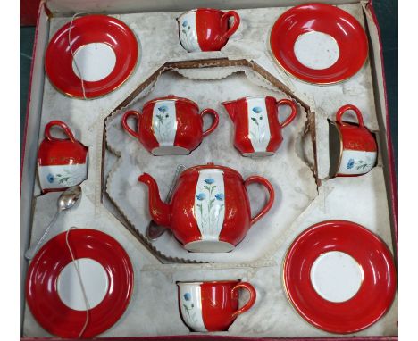 An enamel boxed children's tea set