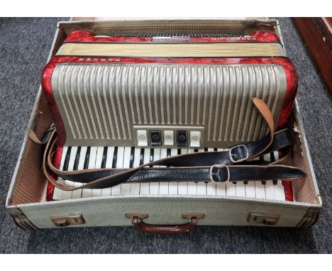 A Hohner 'Carena IIM' piano accordion,&nbsp;in case. 