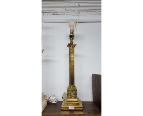 A brass Corinthian column table lamp,&nbsp;height excluding bulb 53cm. 