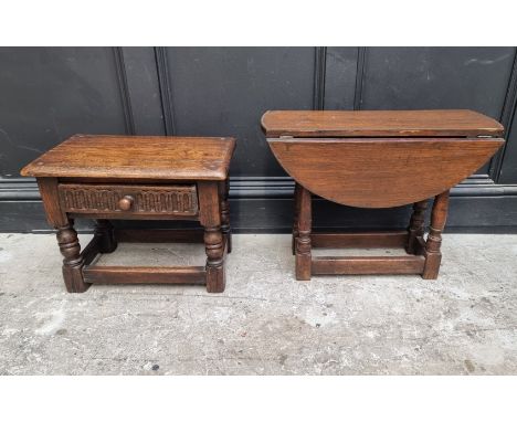 A small reproduction oak joint stool, with drawer,&nbsp;48cm wide; together with a similar drop leaf table, 60.5cm wide. (2) 