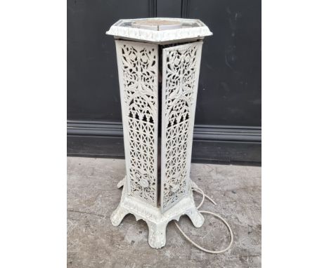 An old cast iron heater, (converted to a lamp), 86cm high. 