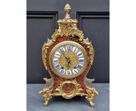 A good Louis XV style tortoisehell and boulle mantel clock, 42cm high, with pendulum. 