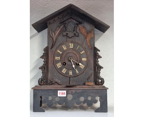A old oak cuckoo mantel clock,&nbsp;42.5cm high, (no pendulum). 