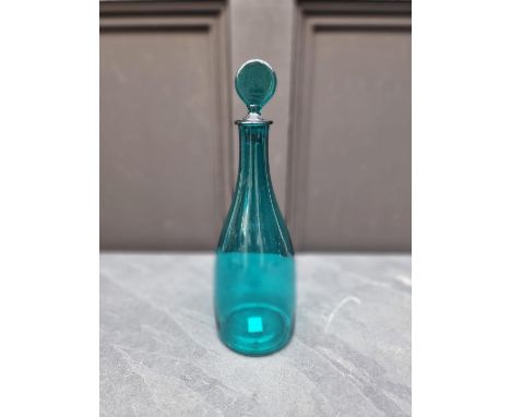 A Georgian green glass decanter and stopper,&nbsp;30cm high. 