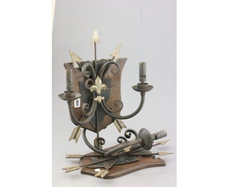 A Pair of Vintage Medieval style Wall Lights on oak shields 