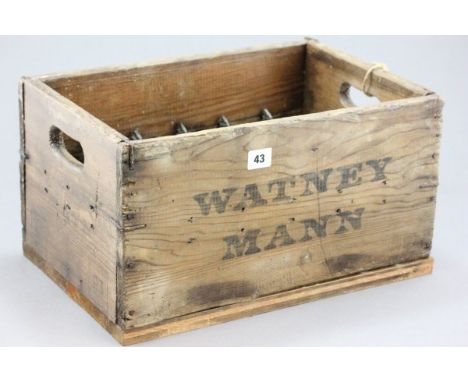 A Vintage Wooden Watneys Beer Crate with twenty bottle compartments 