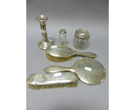 A Silver Candlestick, Silver Brush Set and Lidded Jars 