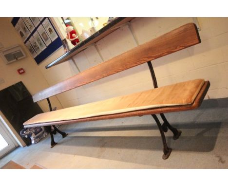An Antique Elm Bench with wrought iron legs and supports 