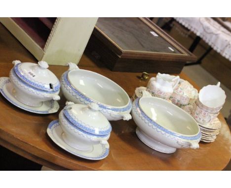 A Victorian Pink Flower Tea Service together with a Pair of Victorian Blue and White Sauce Tureens with stands plus a Pair of
