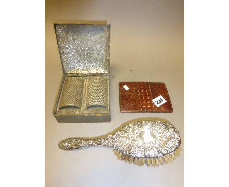 A Silver Backed Dressing Brush, Crocodile Skin Wallet and a Vintage Spice Tin Grater 