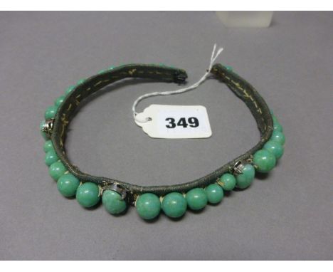 Green Choker Necklace set with three white metal mounted oval jade panels and thirty eight jade beads 