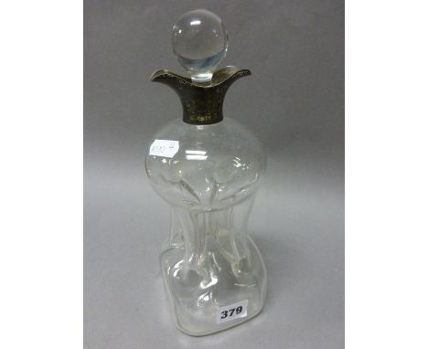 A Glass Decanter and Stopper with silver collar 