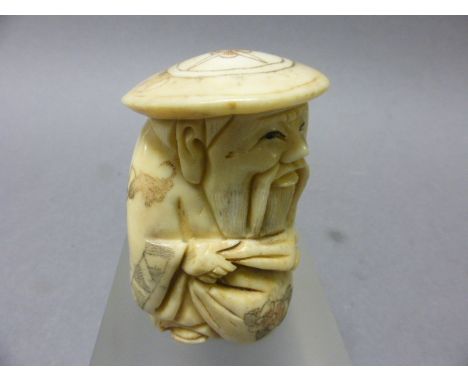 Signed Netsuke of an Old Man with Sack & Stake