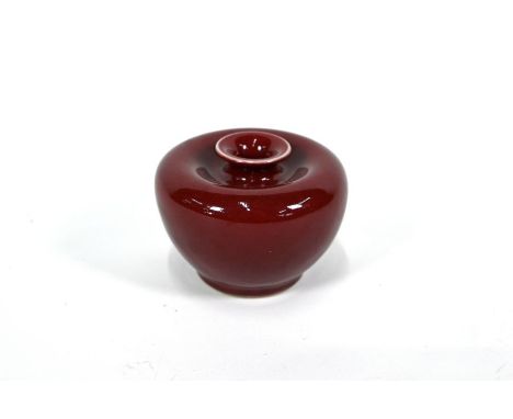 A Chinese Langyao red glazed scholars water pot of globular form with short sunken neck, Kangxi style, 9 cm highGood conditio