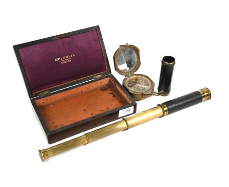 A Victorian brass three-draw pocket telescope with leather grip 42-15 cm to/w a brass bearing-compass stamped 'Stanley, Londo