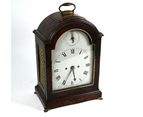 In the style of Joseph French, a mahogany twin fusee bracket clock with white enamelled arched Roman numeral painted dial inc