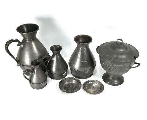 A German Art Nouveau Kaiserzinn pewter stemmed punch bowl and cover with twin handles and stylised trees bearing fruit and fl