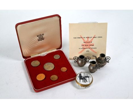 A cased six piece set of new Baiza coinage 1976, Sultanale of Muscat and Oman to/w a miniature white metal three piece coffee