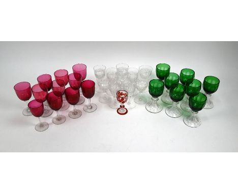 Eleven various cranberry drinking glasses, to/w eight green wine glasses on flared clear-glass stems, ten cut sherry/port gla