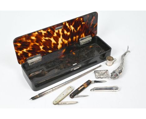 An Edwardian tortoiseshell pen-box with silver hinges, London 1904, to/w a quill-pen, Chester 1918, a fruit-knife Sheffield 1