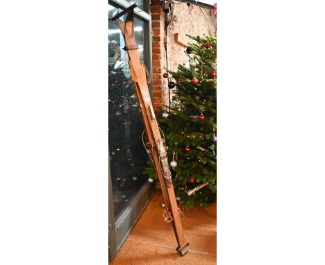 A pair of vintage wooden Nordic skis, to/w bamboo poles - reputedly used by Col Robert Redhead in the British Biathlon Team a