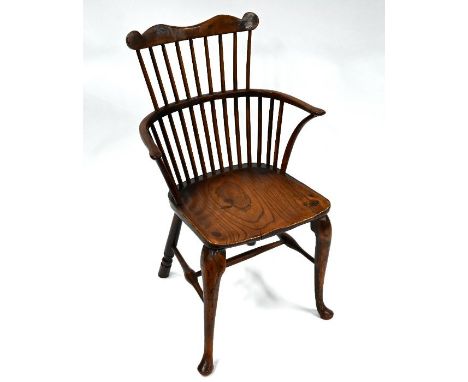 A yew and elm comb-back Windsor elbow chair, 19th century&nbsp;Small old split to front of seat, chair solid, right hand side