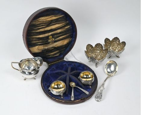A Victorian pair of open salts, London 1875, with similar bead-edge spoons, a cauldron cream-jug Birmingham 1925, Continental