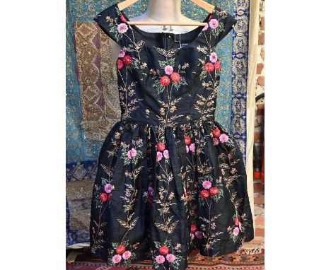 A vintage Monsoon Twilight short evening dress, black silk taffeta, richly embroidered with gold thread and bead work, fitted