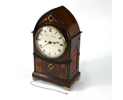 Parkinson &amp; Frodsham, London, a Regency brass inlaid mahogany lancet form mantel clock, the twin fusee movement with pull