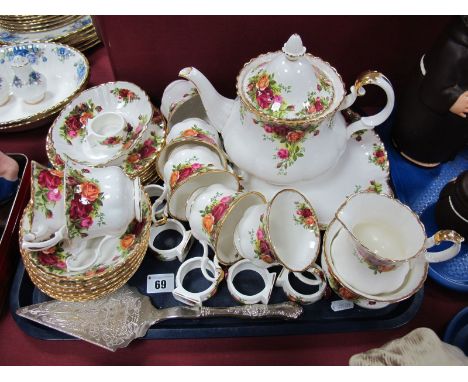 Royal Albert 'Old Country Roses' Tea Set, comprising cake plate, teapot, seven tea plates, seven saucers, six napkin rings, d