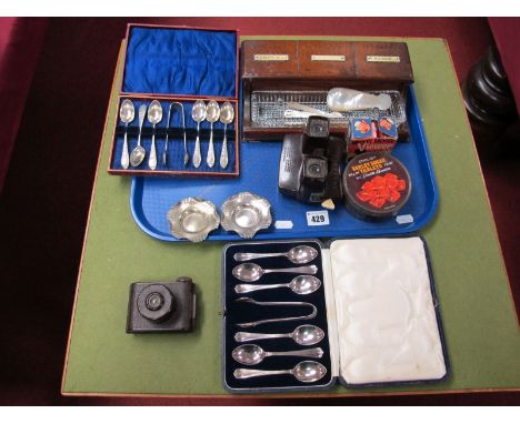A XIX Century Mother of Pearl Caddy Spoon, mother or pearl spoons. A XIX Century inkwell, E.P.N.S cased teaspoons, View maste