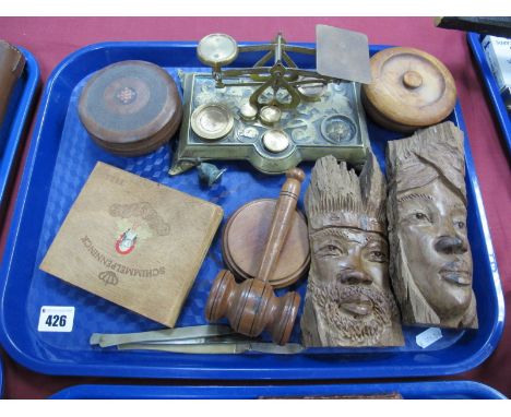 Brass Letter Scales, carved wooden heads by Emmanuel Chikumbirike, gavel, flintop, Mosda and Ronson lighters, etc:- One Tray