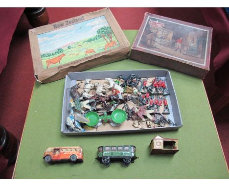 A Collection of Over 25 Lead Military and Cowboy Figures (some mounted on horseback), tinplate scales, clockwork goose, goal 
