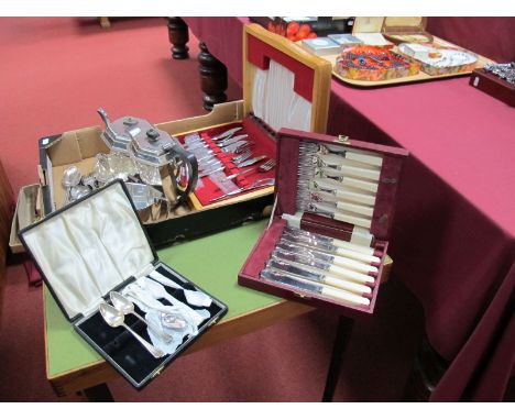 An Electroplated Four Piece Tea Service, of tapering oval form, loose cutlery, cased teaspoons fish knives and forks, etc:- O