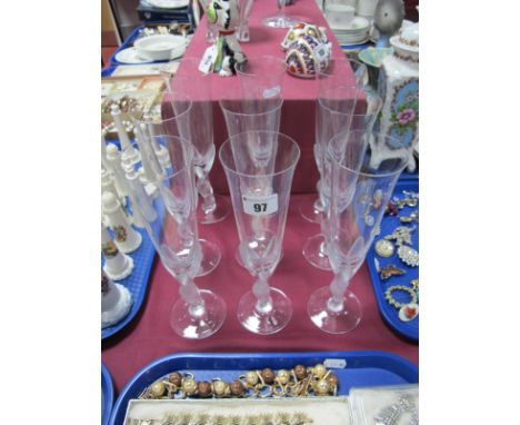 A Set of Nine Igor Carl Fabergé Crystal Champagne Flutes, the stem as frosted 'Kissing Snow Dives'. (9)