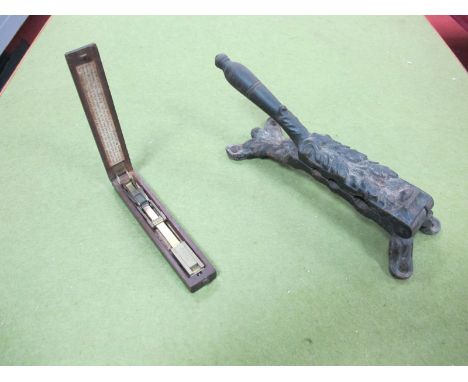 A XIX Century Sovereign Scales, bearing paper label A. Wilkinson, Ormskirk. A cast iron cork compressor. (2)