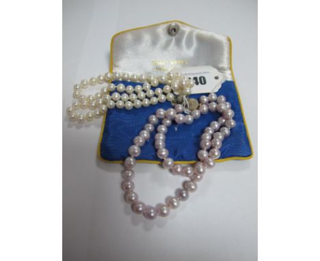 A Modern Single Strand Mauve Fresh Water Pearl Bead Necklace, of uniform design, to magnetic clasp, together with another fre