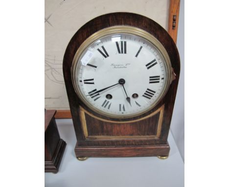 An Oak Dome Cased Mantel Clock, with G.B & E French eight day movement, bearing retailers label 'Finnegan's of Manchester' to