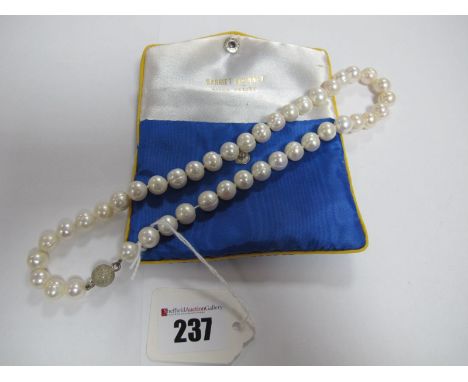 A Single Strand Fresh Water Pearl Bead Necklace, of uniform design, to magnetic clasp.