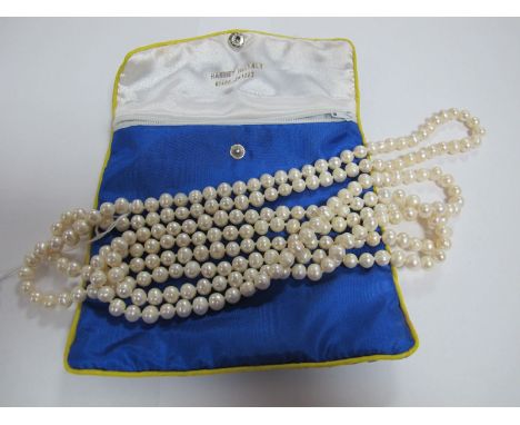 A Modern Long Single Strand Fresh Water Pearl Bead Necklace, of uniform design.