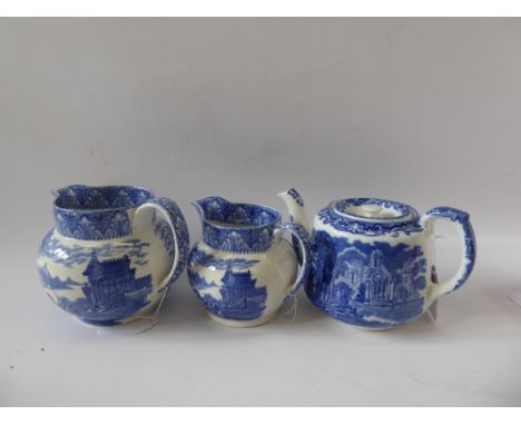 Three 1930's Blue and White Cauldon 'Chariot' Graduated Jugs and a teapot. (4)